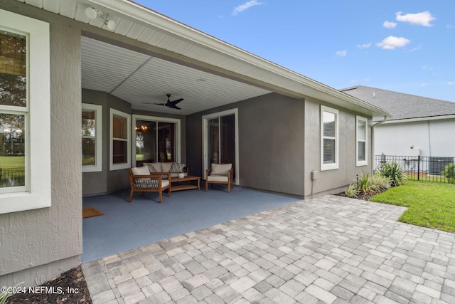 view of patio / terrace with an outdoor hangout area and ceiling fan