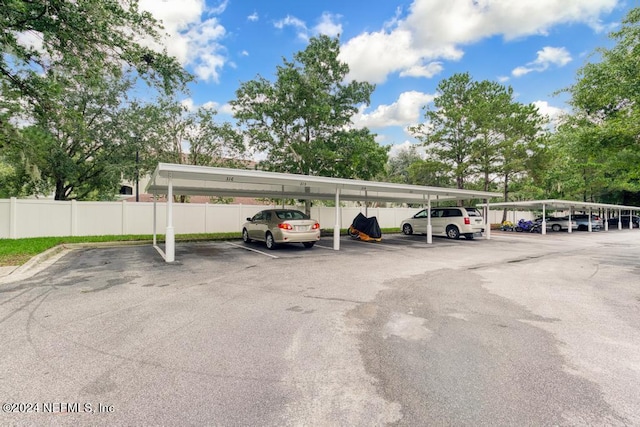 view of parking featuring a carport