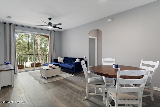 dining room featuring ceiling fan and hardwood / wood-style flooring