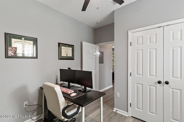 home office featuring ceiling fan and light wood-type flooring