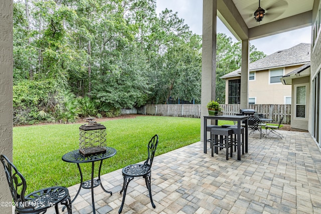 view of patio / terrace featuring ceiling fan