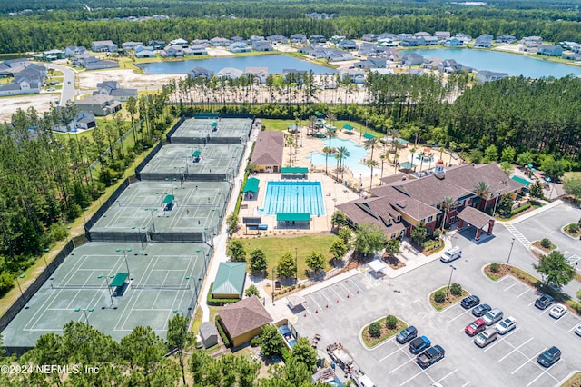 birds eye view of property featuring a water view