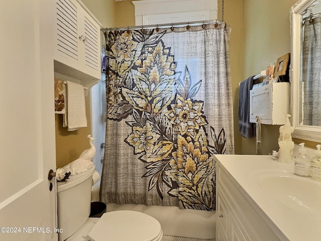 full bathroom featuring vanity, toilet, and shower / tub combo