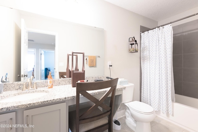 243 Bluejack Ln, Saint Augustine, FL 32095 - bathroom with vanity, tile patterned flooring, shower / bath combo with shower curtain, a textured ceiling, and toilet