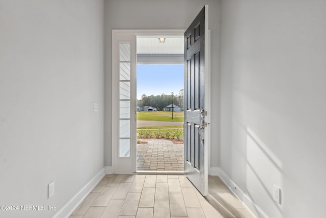 85212 Sandy Ridge Loop Unit 0023, Yulee, FL 32097 - doorway to outside featuring baseboards