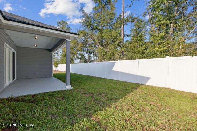 85212 Sandy Ridge Loop Unit 0023, Yulee, FL 32097 - view of yard featuring a patio