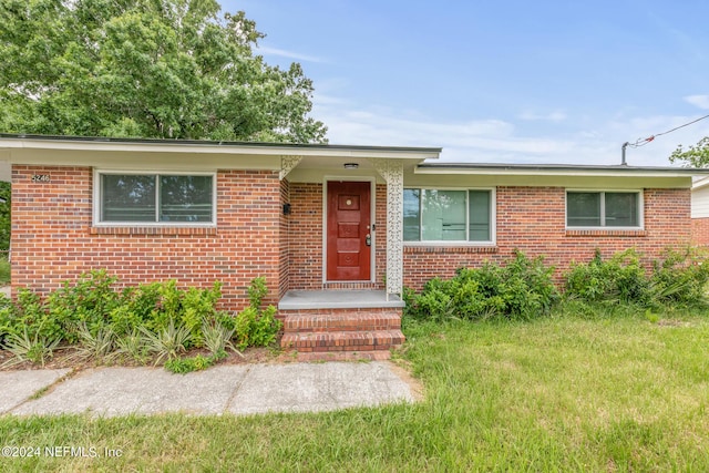 5246 Devron Dr, Jacksonville, FL 32209 - ranch-style house with brick siding