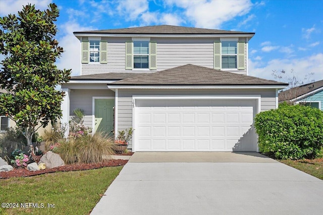 view of front property with a garage