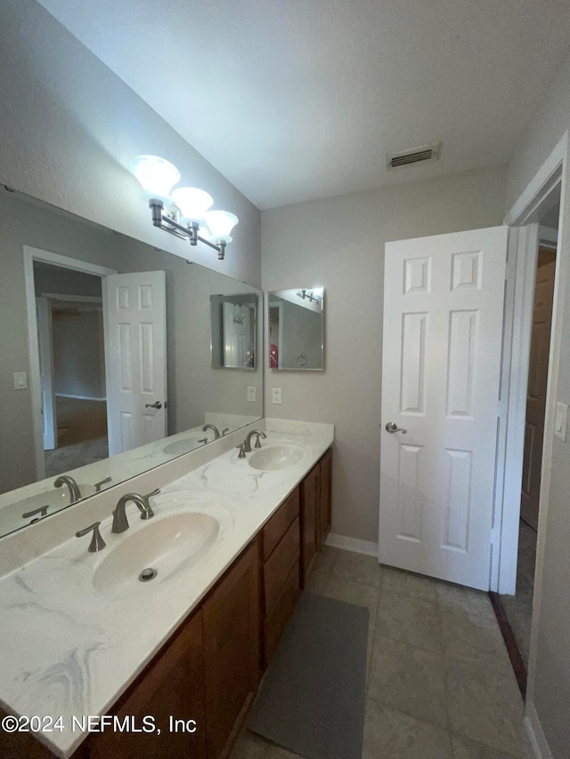 bathroom featuring vanity and tile patterned floors