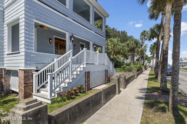 view of property exterior featuring ceiling fan