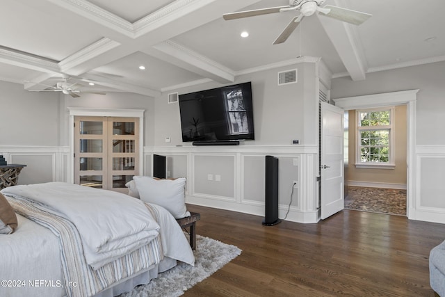 bedroom featuring ceiling fan, beamed ceiling, and dark wood-type flooring