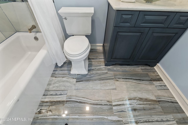 full bathroom with shower / bath combo, vanity, and toilet