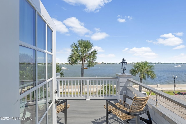 deck featuring a water view