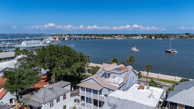 drone / aerial view featuring a water view