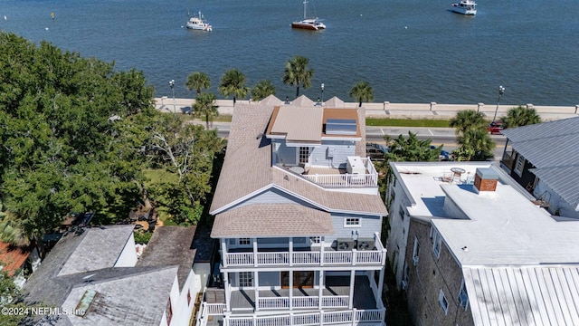 bird's eye view with a water view