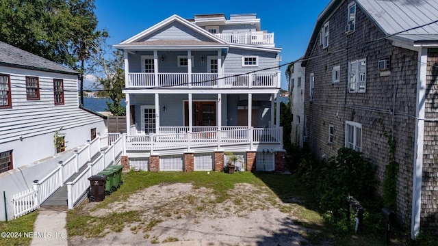 rear view of house featuring a balcony