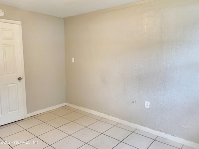 view of tiled spare room