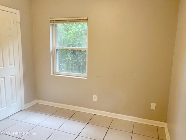 view of tiled spare room