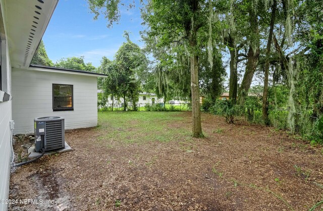 view of yard featuring central AC