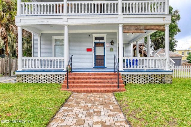 view of front facade with a porch and a front yard