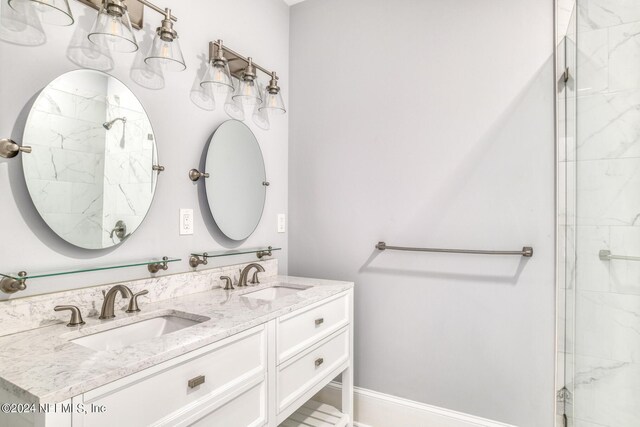 bathroom featuring vanity and walk in shower