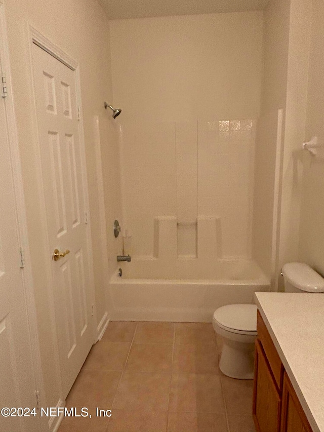 full bathroom featuring vanity, toilet, shower / bath combination, and tile patterned floors