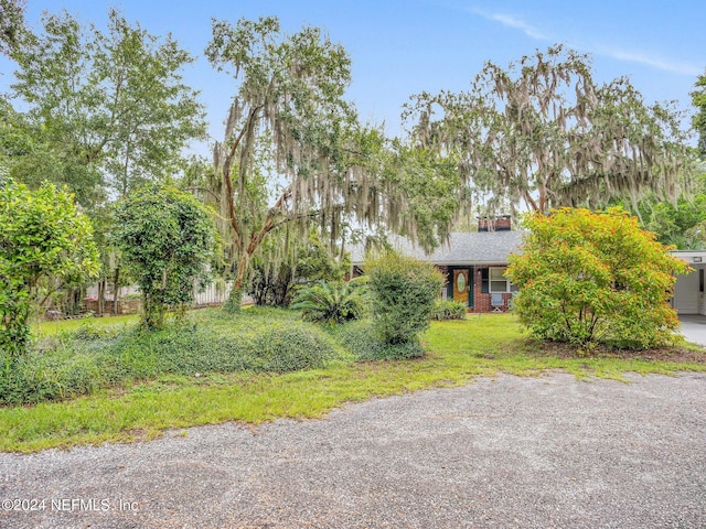 view of front of home with a front lawn