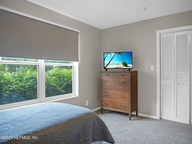 bedroom with light colored carpet