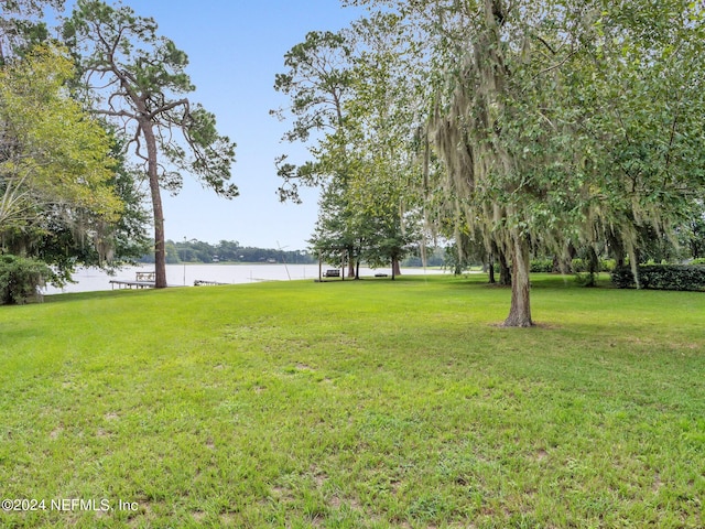 view of yard with a water view