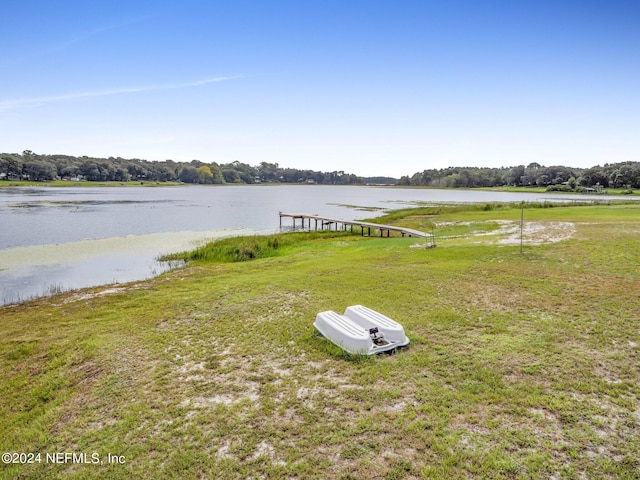 exterior space with a water view