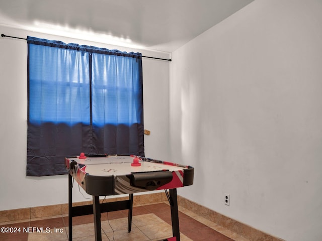 playroom featuring tile patterned flooring