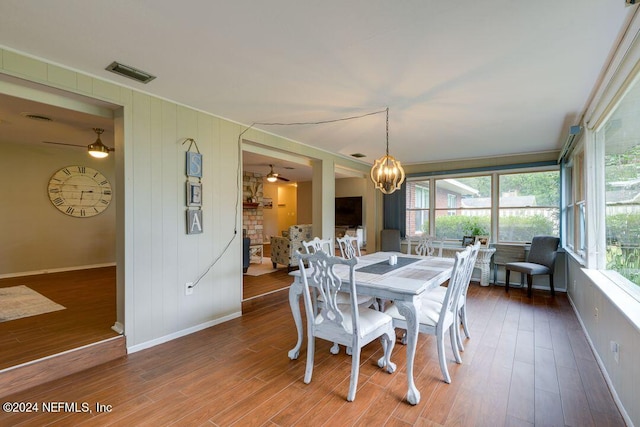 interior space with hardwood / wood-style floors and ceiling fan