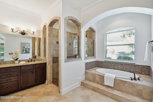 bathroom with plus walk in shower, vanity, a wealth of natural light, and crown molding