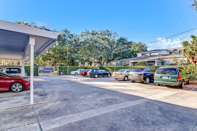 view of car parking featuring a carport