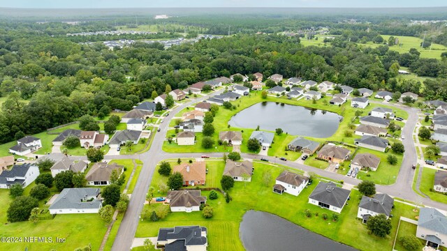 drone / aerial view featuring a water view