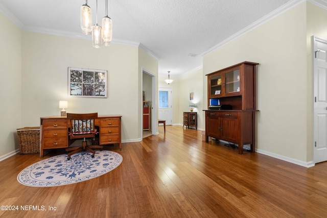 home office featuring hardwood / wood-style floors, an inviting chandelier, crown molding, and a textured ceiling