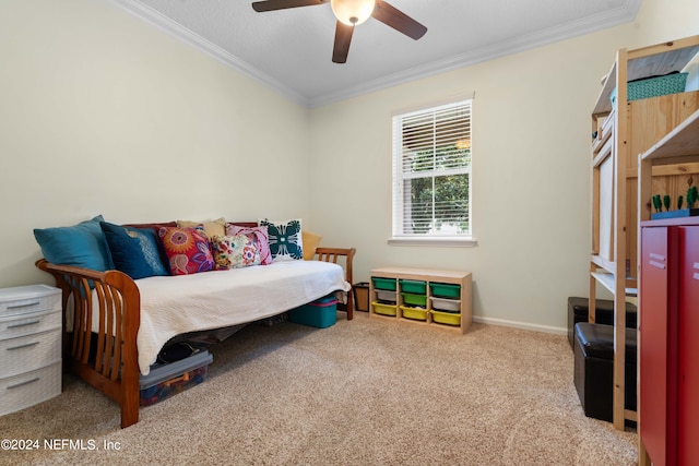 bedroom with ceiling fan, crown molding, and light carpet