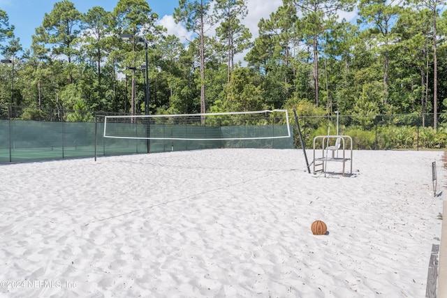 view of property's community featuring volleyball court