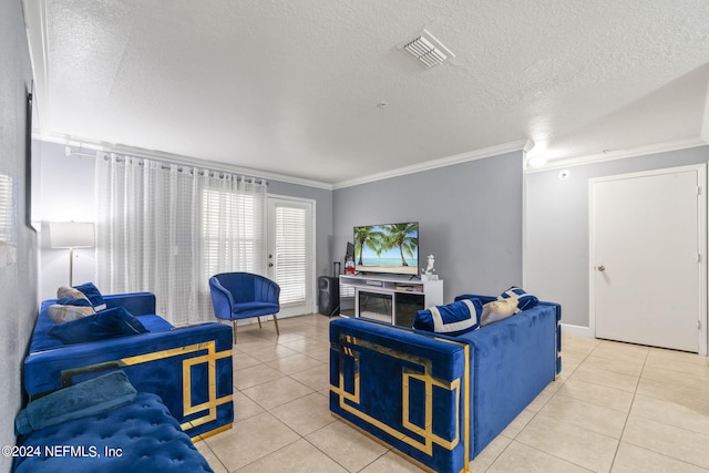 tiled living room with crown molding and a textured ceiling