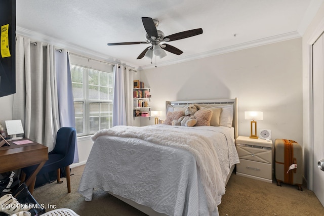 carpeted bedroom featuring crown molding and ceiling fan