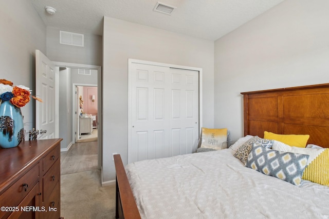 carpeted bedroom with a closet