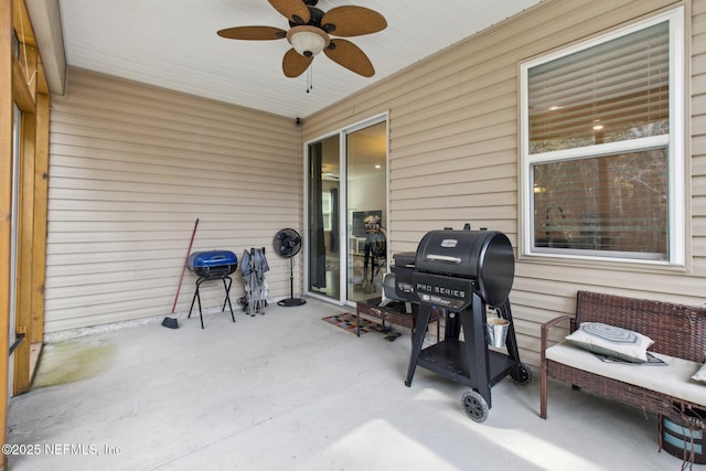 view of patio with grilling area and ceiling fan