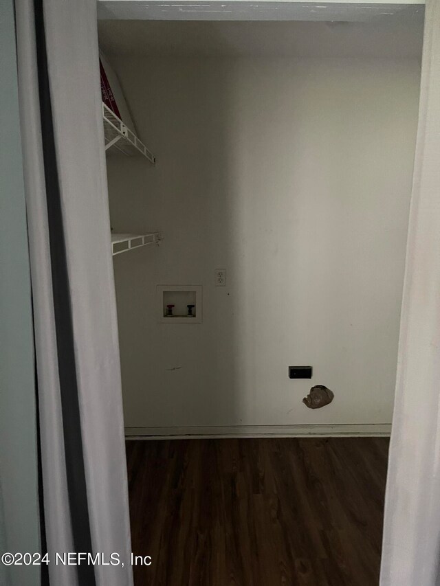 laundry room featuring hookup for a washing machine and dark hardwood / wood-style floors