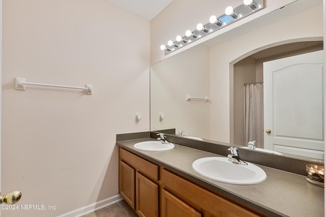 bathroom featuring vanity and tile patterned floors