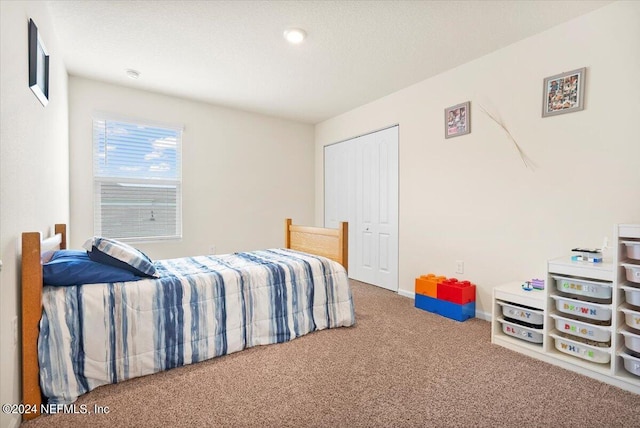 bedroom featuring carpet flooring