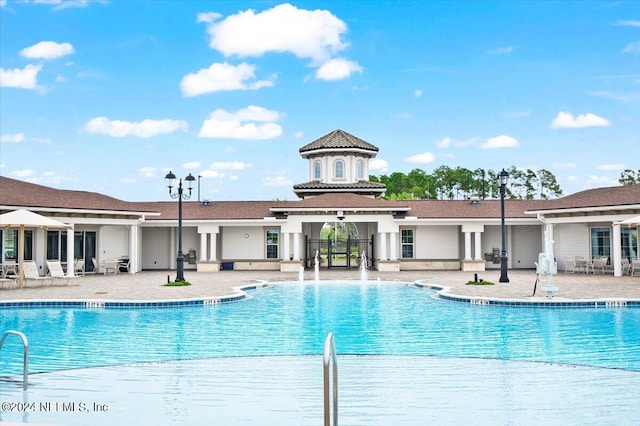 view of pool featuring a patio area