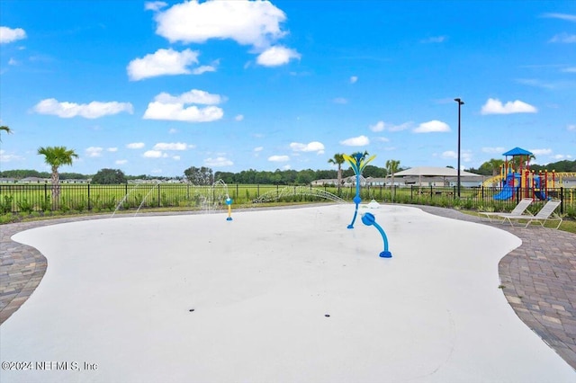 view of home's community featuring a playground