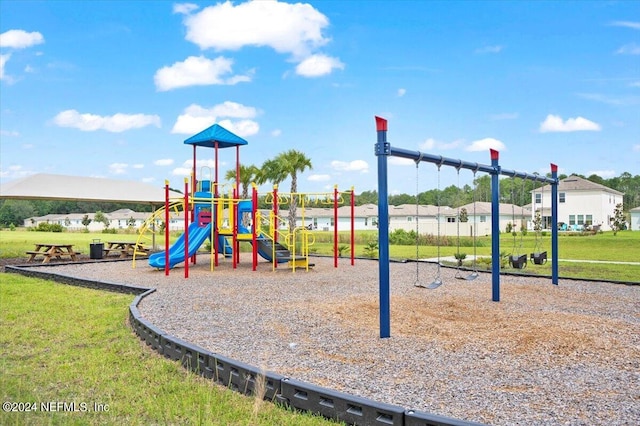 view of jungle gym featuring a yard