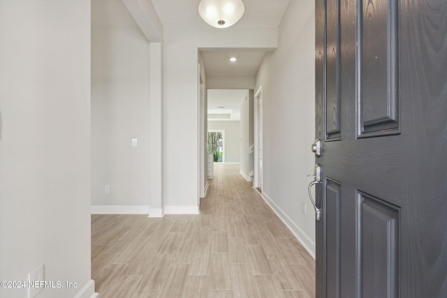 hallway featuring light wood-type flooring