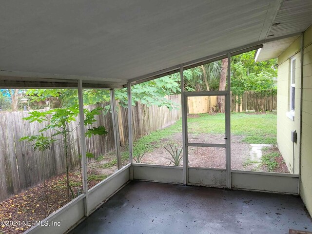 unfurnished sunroom with a wealth of natural light